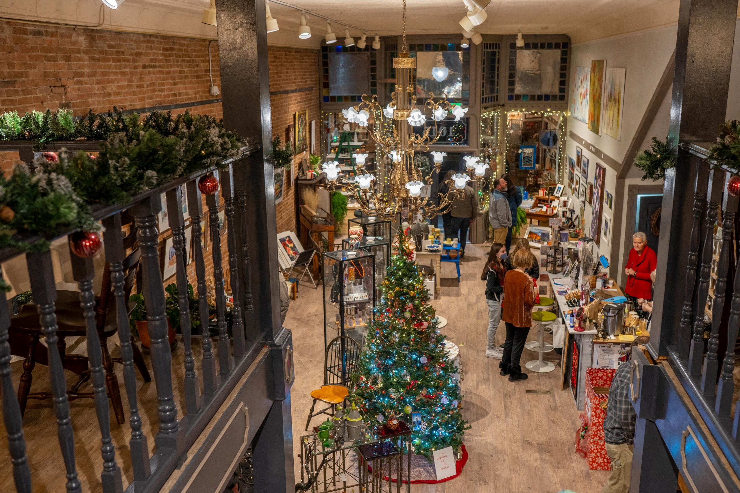 Photograph of an overview of a store decorated for Christmas.