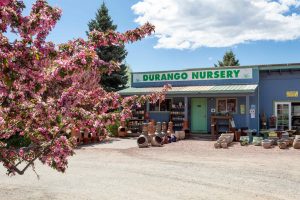 Durango Nursery Photography of building with sign reading "Durango Nursery"