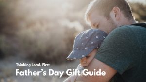 Father’s Day Guide A photograph of a man holding a toddler.